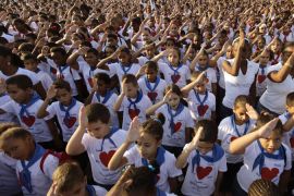 cuba kids celebrate [Reuters]