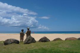 US soldiers overlook Major's Bay at the Pacific Missile Range Facility on the Hawaiian island of Kauai, one of the sites of the Rim of the Pacific (RIMPAC) maritime exercises [Jon Letman/Al Jazeera]