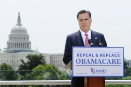 U.S. Republican Presidential candidate Romney reacts to the Supreme Court''s upholding Obamacare in Washington