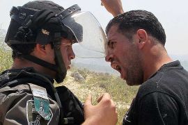 Palestinian man and Israeli soldier