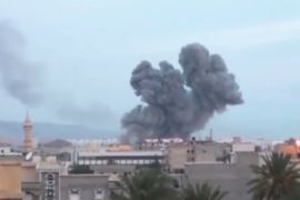 Smoke rising in Derna after an Egyptian air strike in the Libyan city