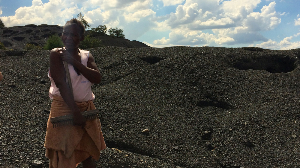 Local residents rely on the residue left behind from the mined coal, but are also victims of the ensuing pollution [Victoria Schneider/Al Jazeera] 