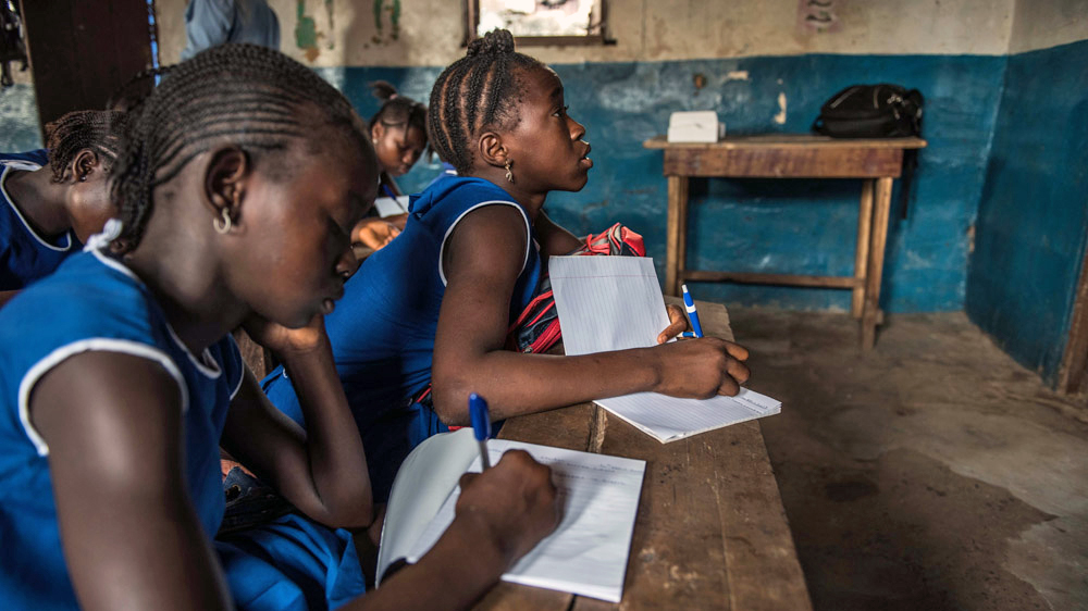 Less than 20 out of 150 grade six students turned up on the first day at the Church of Christ Primary School in Freetown [Tommy Trenchard/Al Jazeera]