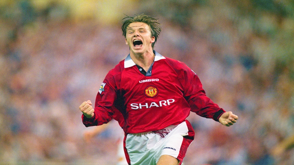 David Beckham celebrates after scoring the third goal in the 1996 FA Charity Shield between Manchester United and Newcastle United on August 11, 1996 [Getty Images]
