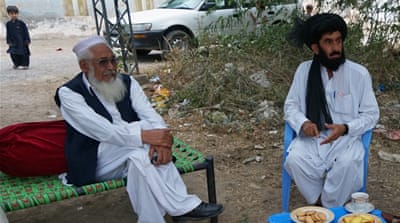 Malik Anwar Baig (left) and Malik Atta Muhammad [Umar Farooq] 