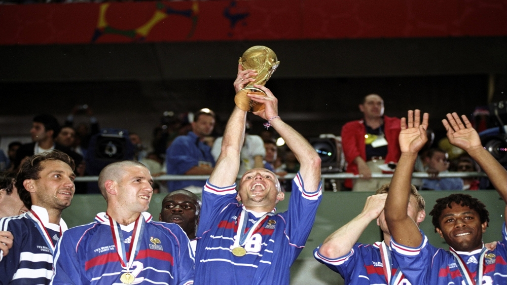 Frank Leboeuf of France proudly lifts the trophy after a 3-0 victory in the World Cup final against Brazil at the Stade de France in St Denis on July 12, 1998 [Allsport]