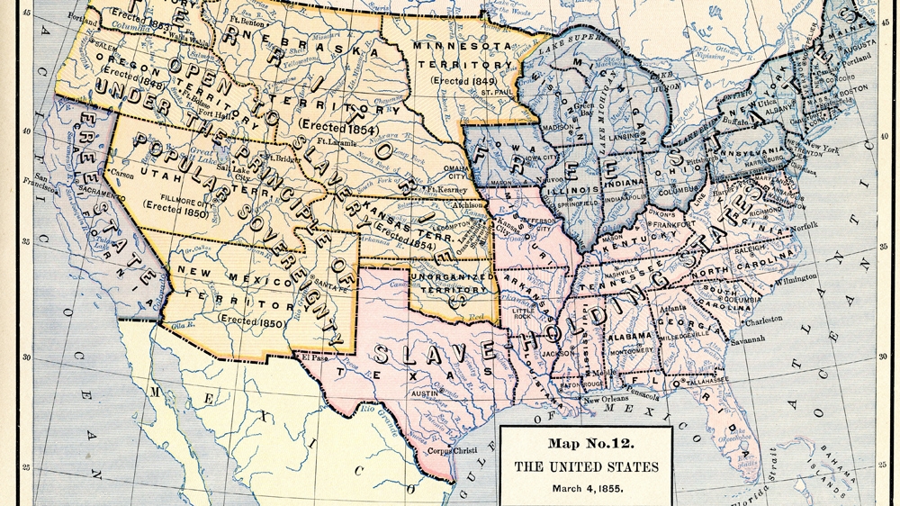 A colour-coded map illustrates the 'Free States,' 'Slave Holding States,' and 'Territories Open To Slavery Under The Principle Of Popular Sovereignty,'. It was published in 1898 [Getty Images]