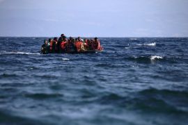 Syrian refugees on a dinghy approach, in rough seas, a beach on the island of Lesbos, Greece [REUTERS]