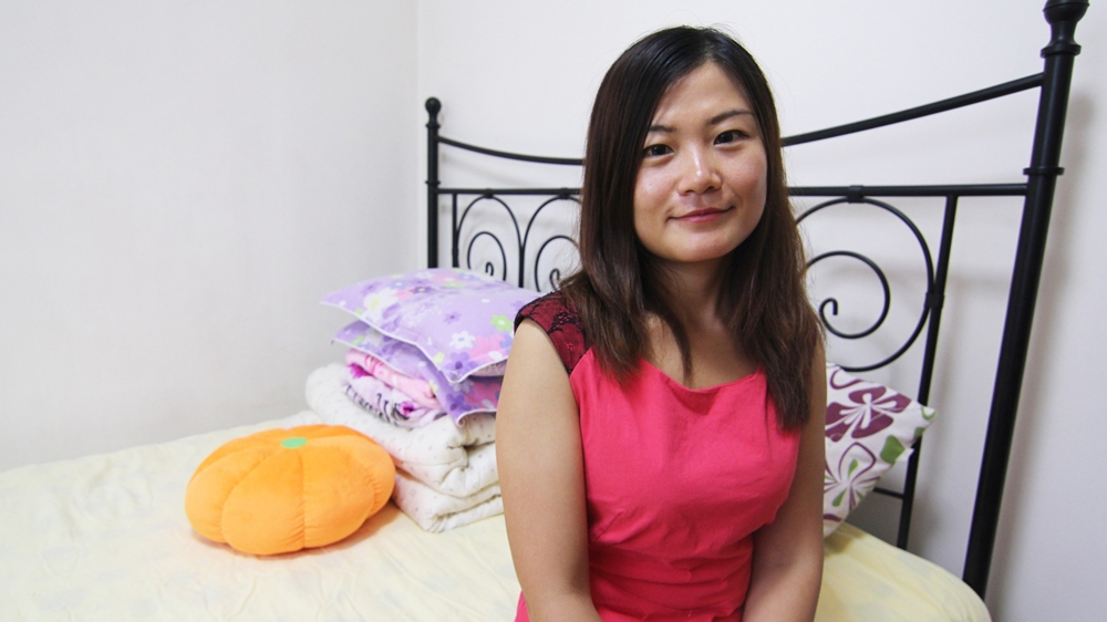 Twenty-seven-year-old Li Yuan was so desperate to rid herself of the 'leftover' label, that she stopped eating [Katrina Yu/Al Jazeera]