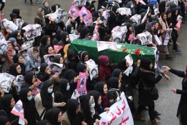Afghan women carry the coffin of a nine-year-old girl as thousands march in the Afghan capital of Kabul on Wednesday [AP]