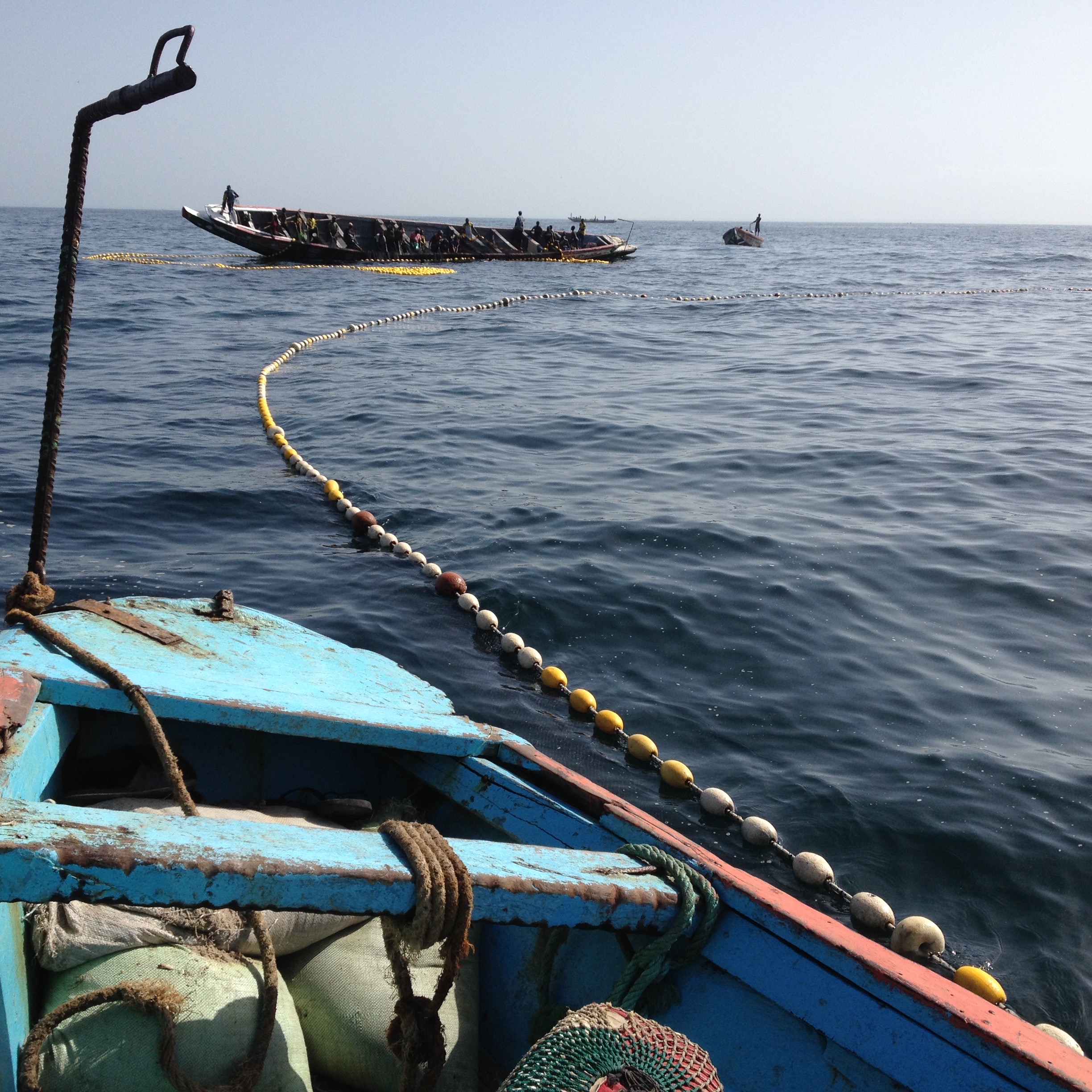 Styrofoam floats of a purse seine curve 48km off the coast of Joal, Senegal [Anna Badkhen/Al Jazeera]