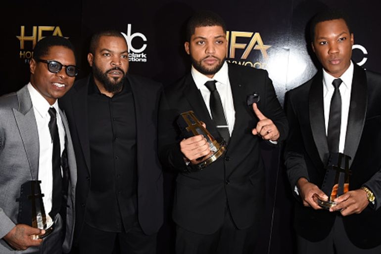 Actors from the film Straight Outta Compton pose with rapper Ice Cube in the press room during the 19th Annual Hollywood Film Awards last November [Getty]