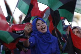 Libyans celebrate the third anniversary of the revolution against Muammar Gaddafi at Martyrs'' Square in Tripoli