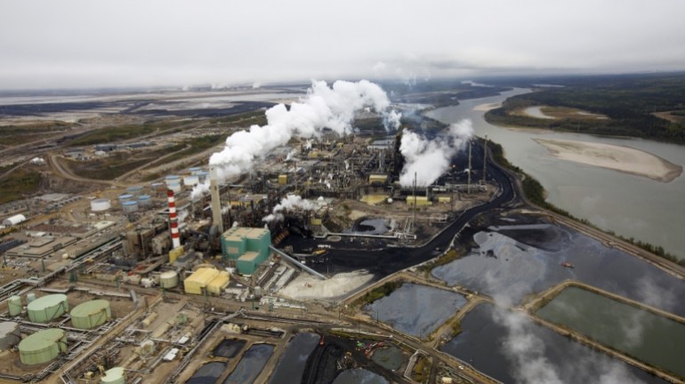The Suncor tar sands processing plant near the Athabasca River at their mining operations near Fort McMurray, Alberta [REUTERS]