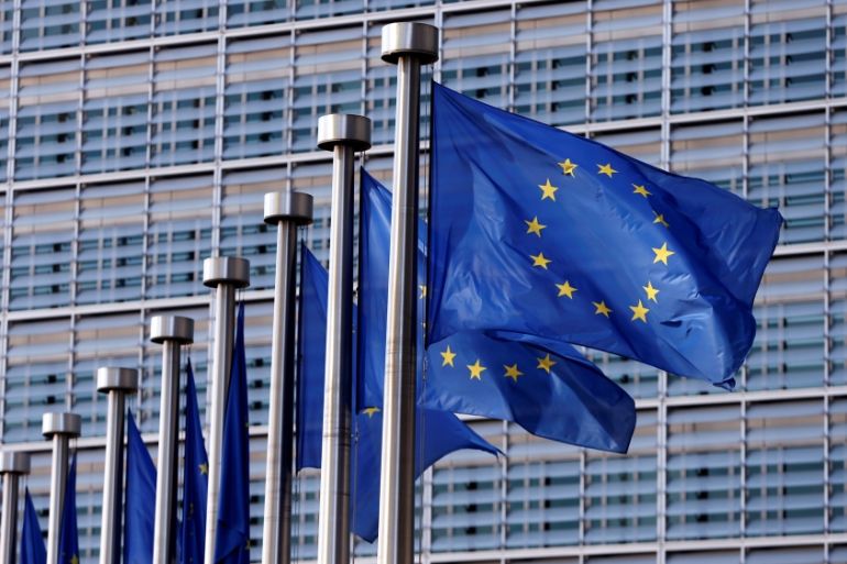 European Union flags flutter outside the EU Commission headquarters in Brussels, Belgium [REUTERS]