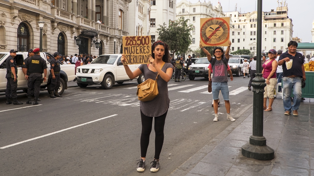 Demonstrators on the streets of Lima [Eline van Nes/Al Jazeera] 
