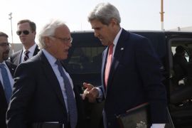 US Secretary of State John Kerry speaks with Martin Indyk, US Special Envoy for Palestinian-Israeli negotiations, in 2013 [Getty]