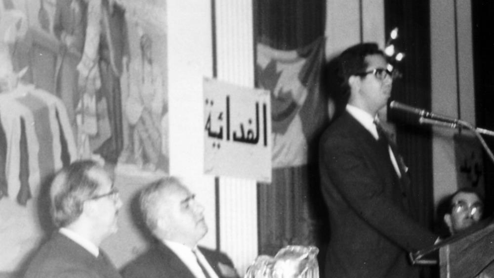 
Addressing the first annual Canadian Arab Federation (CAF) convention in Toronto, 1969. George Tomeh, UN Arab Ambassador is to left, with Ibrahim Salti, CAF President at the podium. [Al Jazeera]

