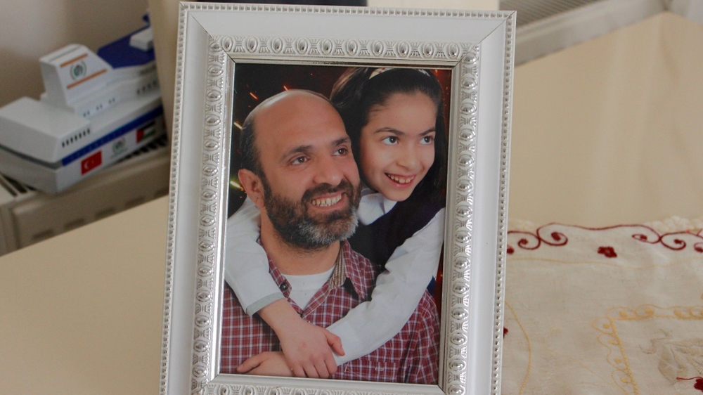 Cengiz Akyuz is pictured with his youngest daughter [Courtesy of Cengiz Akyuz's family]