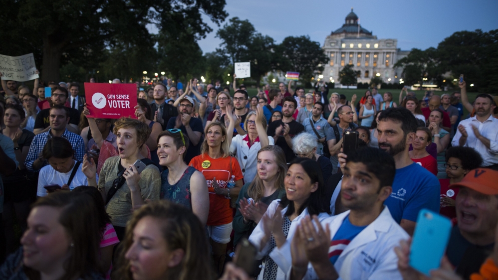 Hundreds of people gathered in front of the Capitol Hall building in Washington DC in support of the Democratic 'sit-in' to demand a vote on gun restrictions [Jim Lo Scalzo/EPA] 
