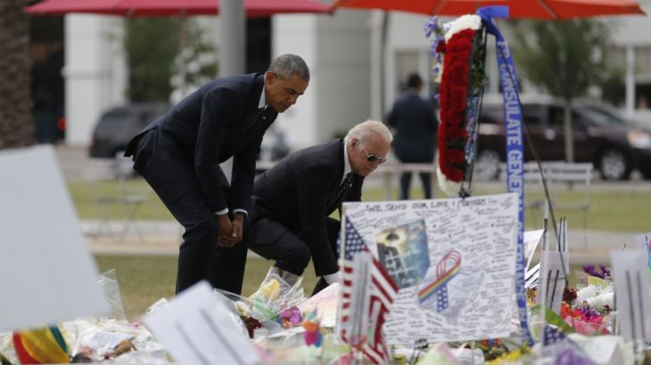 U.S. President Obama and Vice President Biden place flowers at makeshift memorial for shooting victims in Orlando, Florida