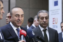 Turkey''s EU Minister Omer Celik and other Turkish officials speak to media as they arrive at the start of EU / Turkey accession intergovernmental conference in Brussels, Belgium [EPA]