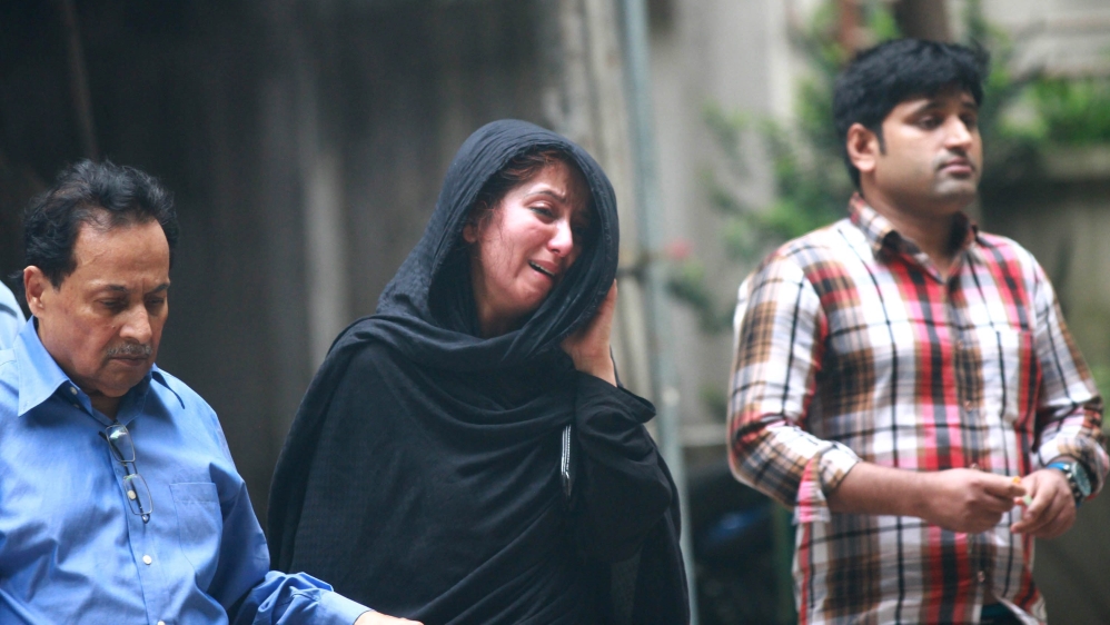 Ruba Ahmed, mother of Emory University student Abinta Kabir, mourns as she arrives to identify her daughter's body [EPA]