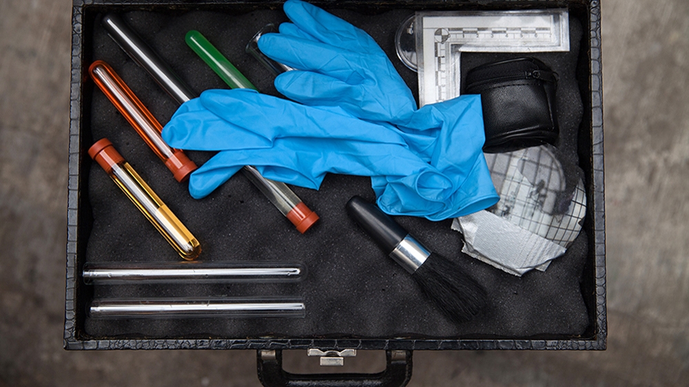 Donovan's forensic cleaning kit includes gloves and some of the 370 formulas he has devised - and memorised - in order to carry out his forensic cleaning. The chemical base for some of his formulas, he says, can cost up to $6,000. He is the director of Limpieza Forense Mexico, the country’s first and only government-accredited forensic cleaning agency [Benedicte Desrus/Al Jazeera]