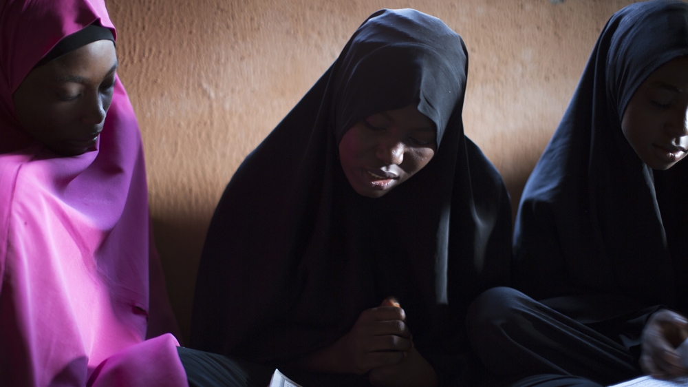 
Fourteen-year-old Hafsat Husseini says she wants to become a doctor 'because I want to help members of the Islamic Movement and everyone in the world' [Chika Oduah/Al Jazeera]
