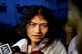 Indian human rights activist Irom Sharmila speaks to the media outside a prison hospital in Imphal