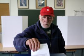 A man votes during a referendum on "Statehood Day" in Laktasi