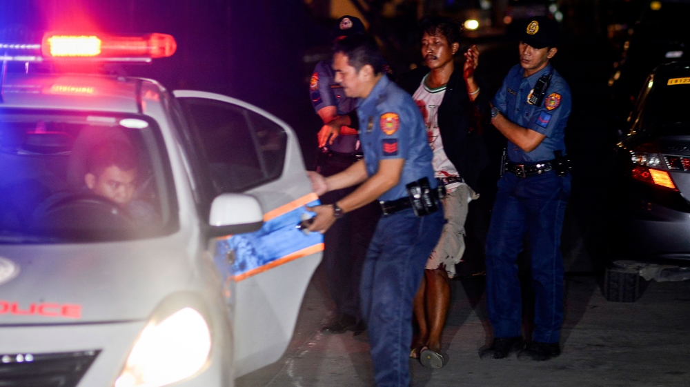 Francisco Santiago Jr during the police operation [Ezra Acayan/Al Jazeera]
