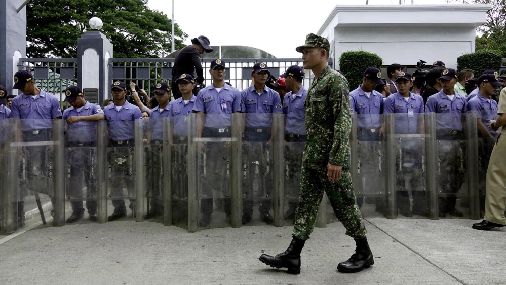 Friday's ceremony in Manila's Cemetery of Heroes was shrouded in secrecy [EPA]