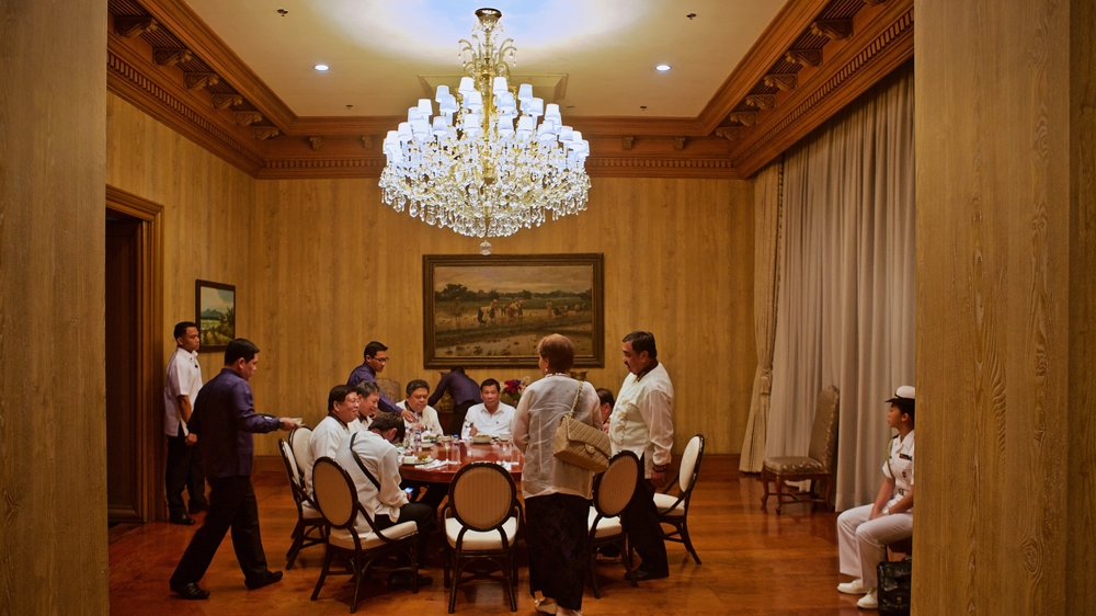 Rodrigo Duterte holds a lunch meeting in Malacanang Palace in Manila. He says the worst part of his job are mundane meetings [101 East/Al Jazeera] 