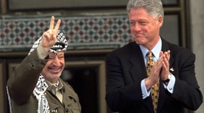 US President Bill Clinton and the late Palestinian leader Yasser Arafat during the official opening ceremony for the passenger terminal at Gaza International Airport in Rafah on December 14, 1998 [AP]