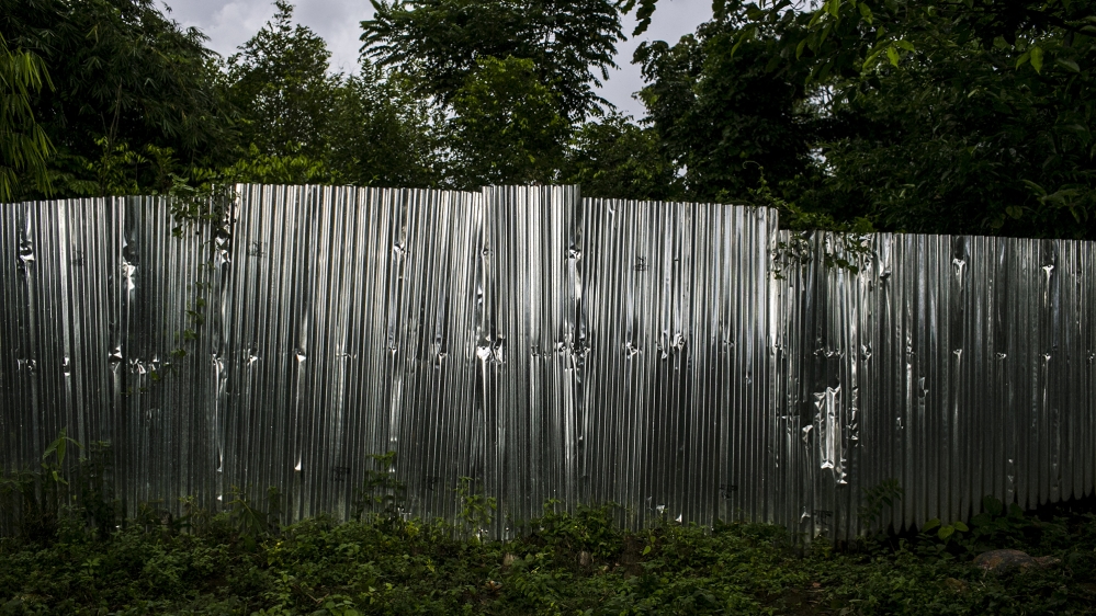 
The perimeter walls of the New Life in Christ Centre, a Kachin Baptist Church rehabilitation compound. The attendees of the rehabilitation centres are not allowed to leave during their time at the camps [David Shaw/Al Jazeera]
