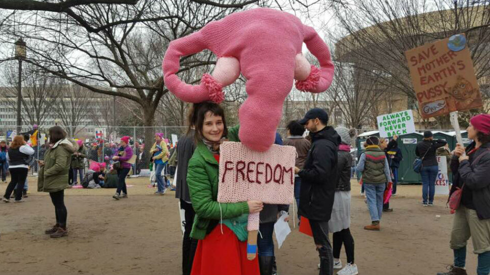 
Margaret Sampson from Pennsylvania brought a knitted uterus to the march to take a stance for reproductive freedom: 'Being able to control your body and your life is the most basic definition of freedom that I can think of and I feel like that freedom is now under threat' [Anar Virji/Al Jazeera]
