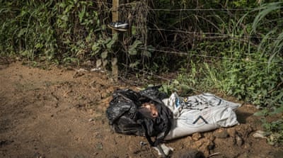 A motorcycle taxi driver found two black sacks by the side of the road. One contained a young man's head, the other his limbs and torso  [Tomasso Protti/Al Jazeera]