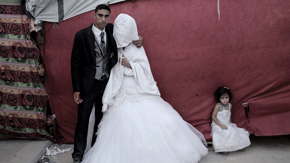 Despite Gaza's ballooning population, the number of marriages in the territory dropped by seven percent last year [EPA]