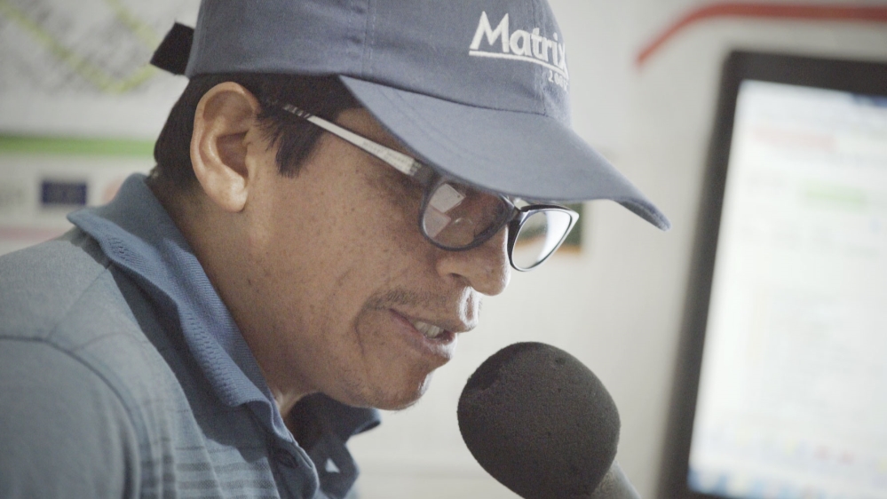 Romulo Loayza, 40, is a local radio presenter in Santa Rosa, a small commercial town at the heart of the VRAEM [Shiori Ito/Al Jazeera]