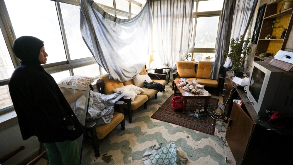 The damage left inside the house after Basil's confrontation with the Israeli occupation army [Reuters]
