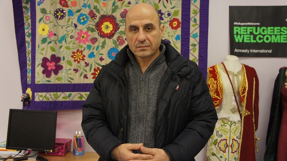 For more than three years, Munir Emkideh has been helping other refugees across Scotland [Zab Mustefa/Al Jazeera]