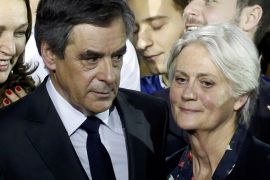 FILE PHOTO - Francois Fillon, former French prime minister, member of The Republicans political party and 2017 presidential candidate of the French centre-right, and his wife Penelope Fillon stand clo