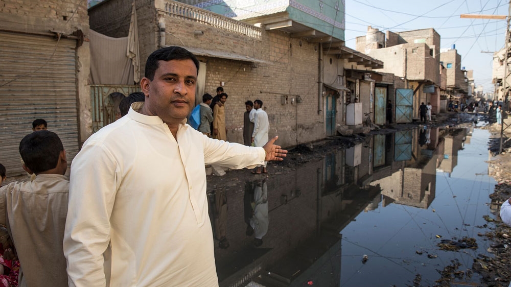 Dug-up roads and overflowing sewage is a common sight in Larkana - a city inhabited by more than 250,000 people [Faras Ghani/Al Jazeera]