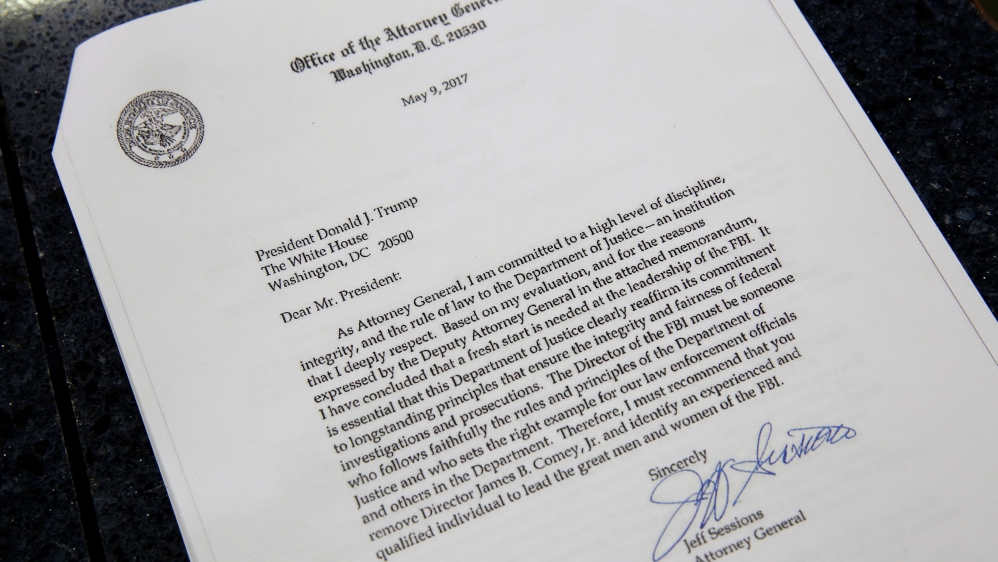 Trump's letter says that he accepted the recommendation of Sessions [Joshua Roberts/Reuters]