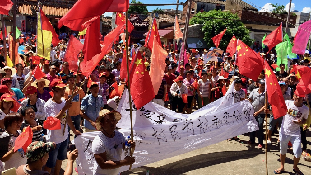 Protesters in Wukan in June 2016 [Lynn Lee/Al Jazeera]