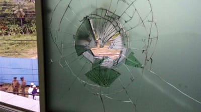 A broken window at the vandalised Kurenegala Mosque [Ashar Careem/Al Jazeera]