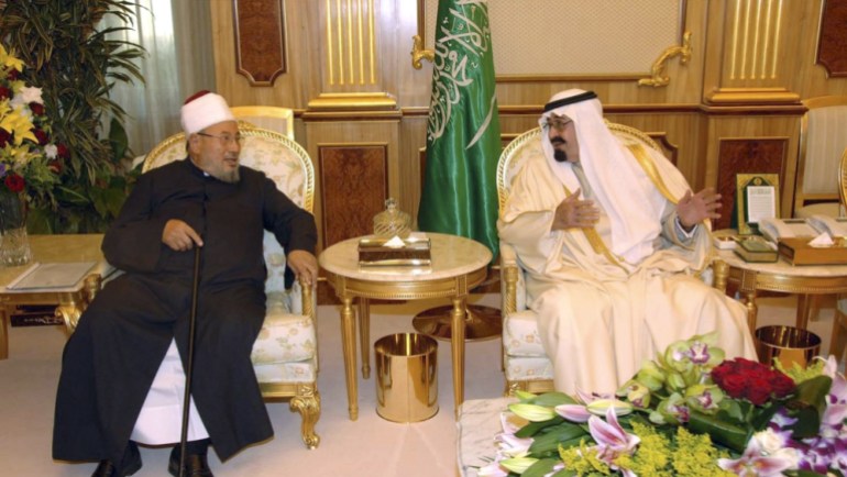 Saudi King Abdullah talks with leading Sunni cleric Youssef al-Qaradawi, President of the International Union for Muslim Scholars in Riyadh