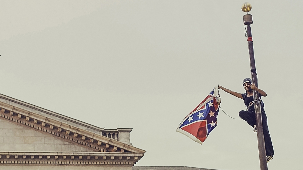 Bree Newsome was arrested after taking down the Confederate flag at the statehouse in South Carolina [File: Adam Anderson/Reuters]