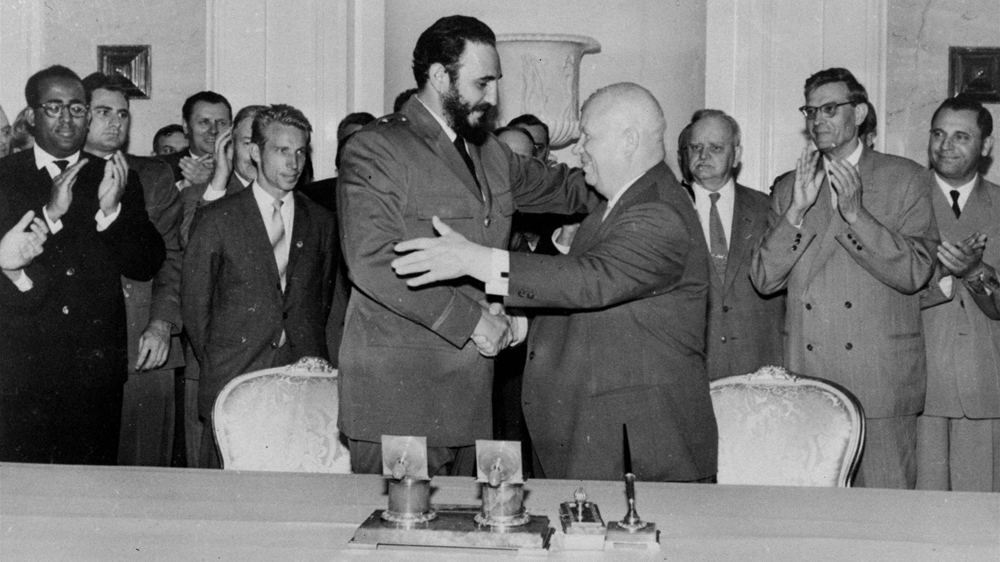 Fidel Castro shakes hands with Soviet premier Nikita Khrushchev in Moscow on May 23, 1963. While Guevara had grown increasingly critical of the Soviet Union, Castro was further cosying up to the country on which Cuba's economy depended [TASS/Associated Press] 